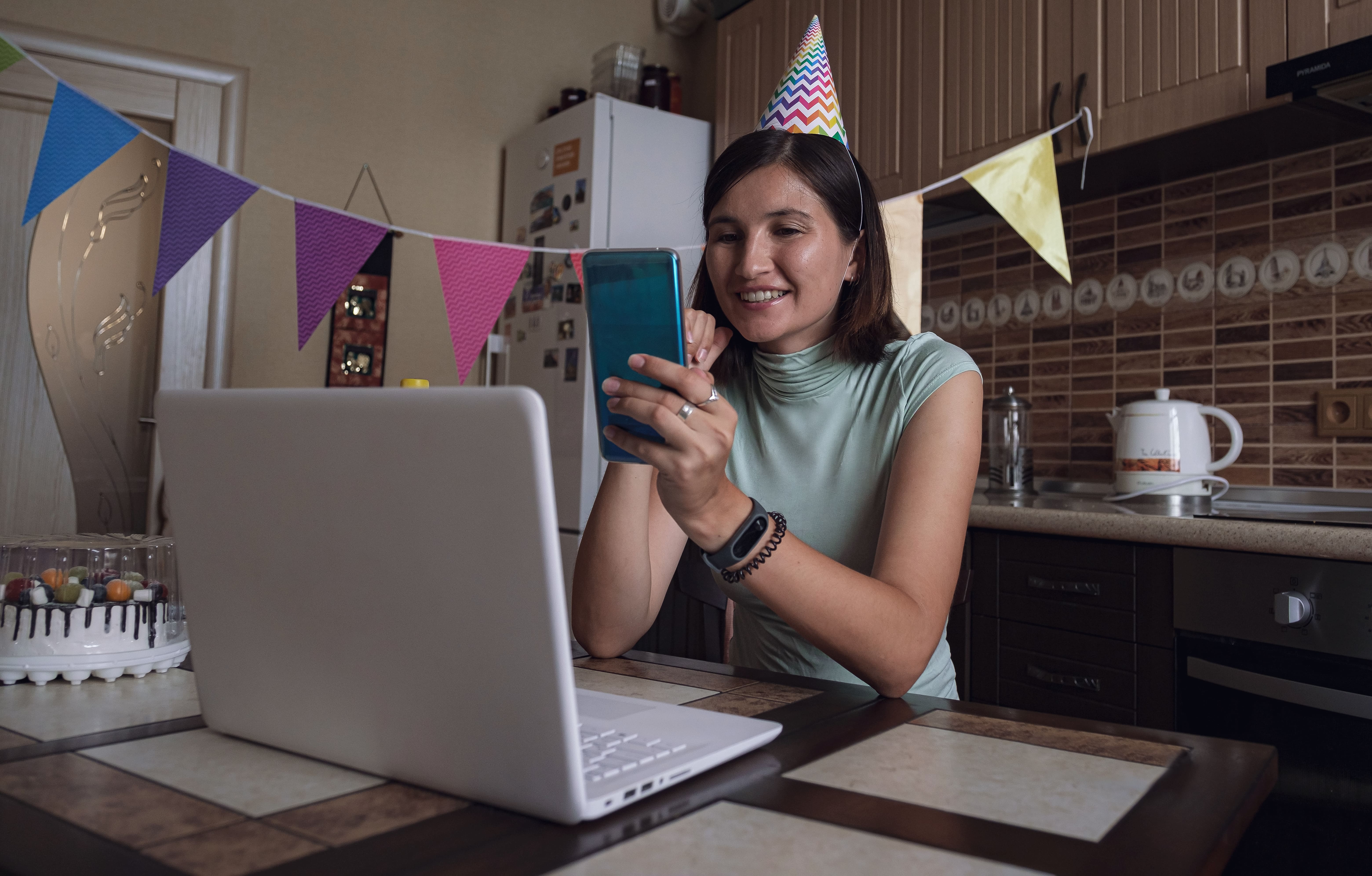 A girl celebrating birthday online in quarantine time