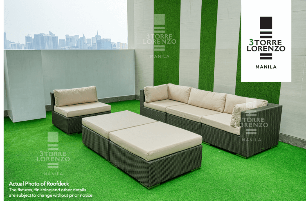 a couches and chairs on a green carpet at 3Torre Lorenzo roofdeck