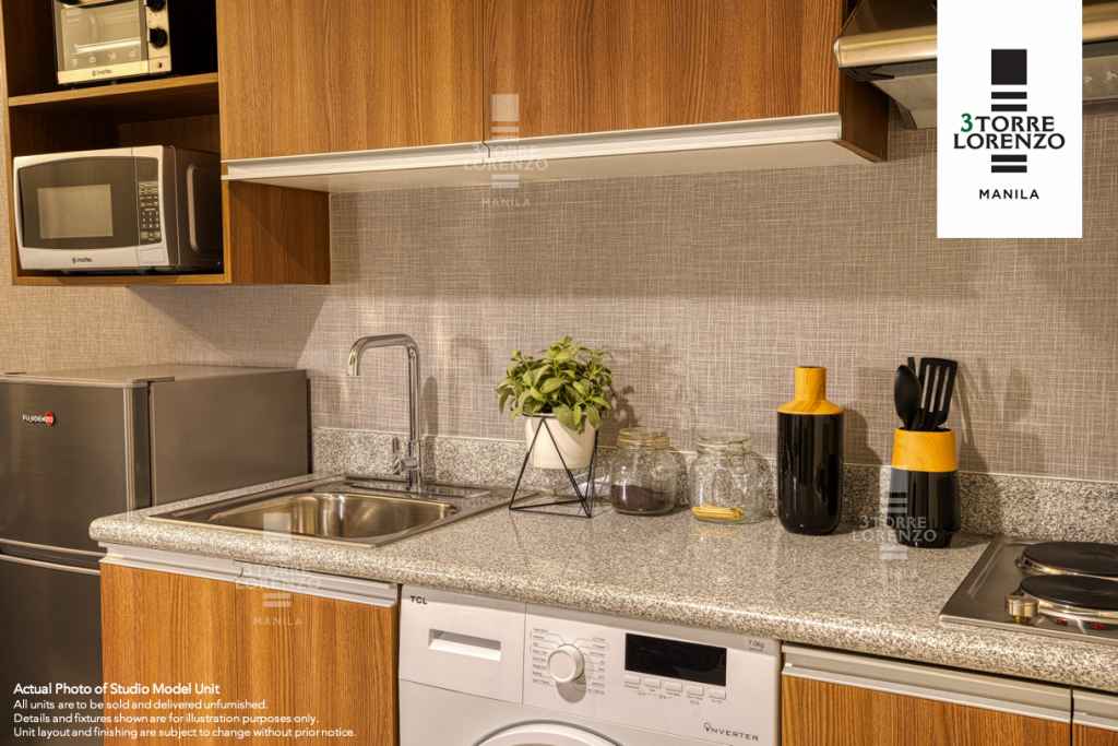 a kitchenette equipped with home appliances at 3Torre Lorenzo